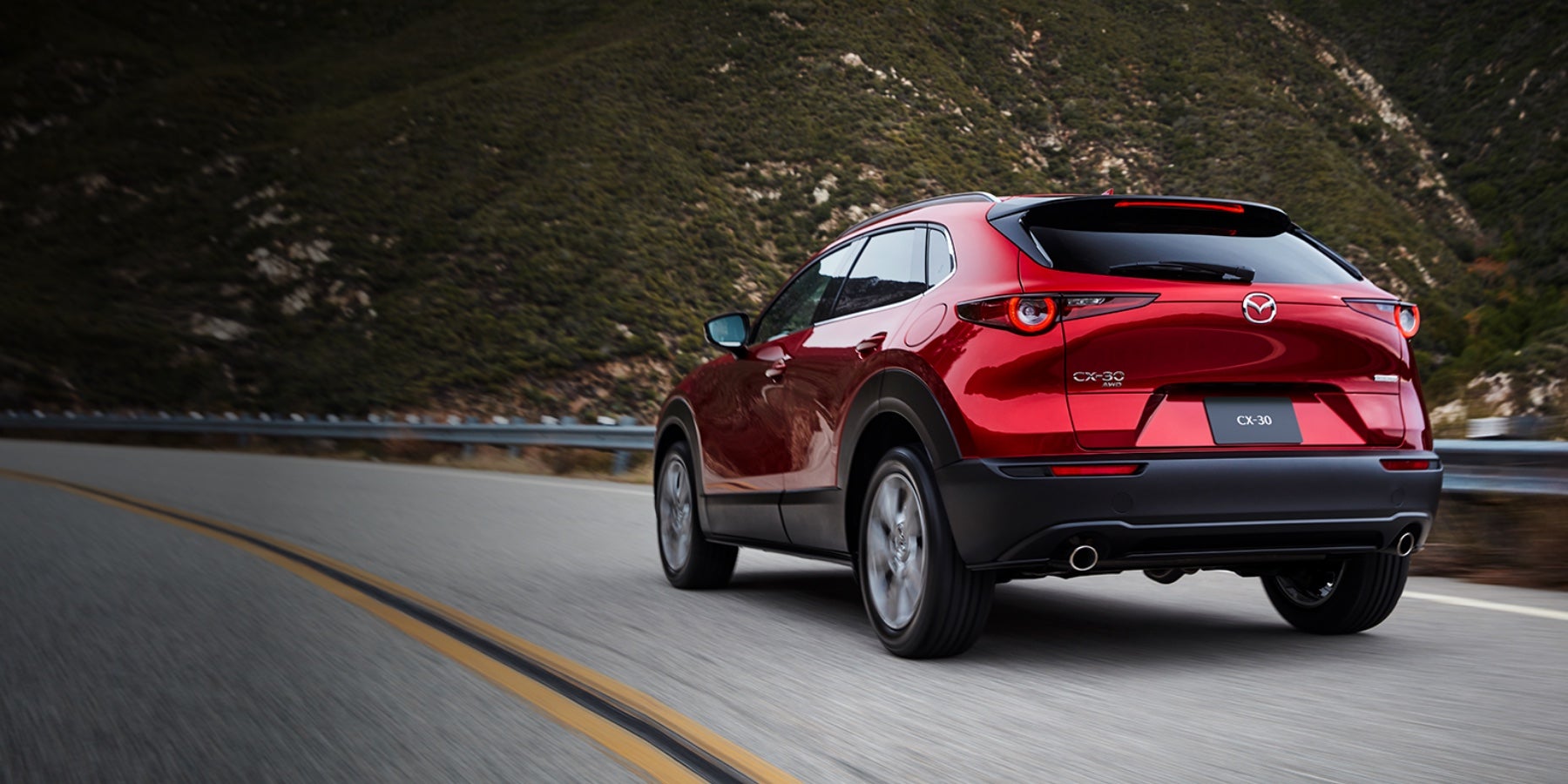 Red 2020 Mazda CX-30 Driving on the road | Open Road Mazda of Morristown in Morristown, NJ