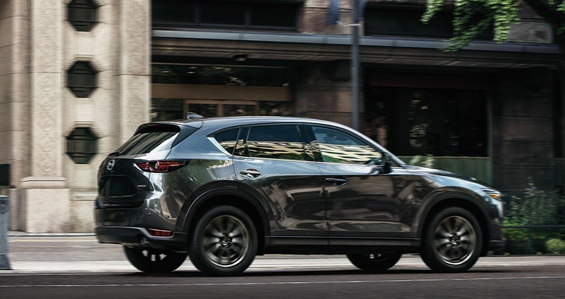 Grey 2020 Mazda CX-5 Driving on the road | Open Road Mazda of Morristown in Morristown, NJ